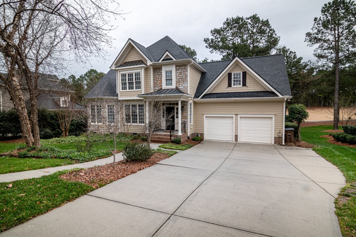 Residential home with a concrete driveway